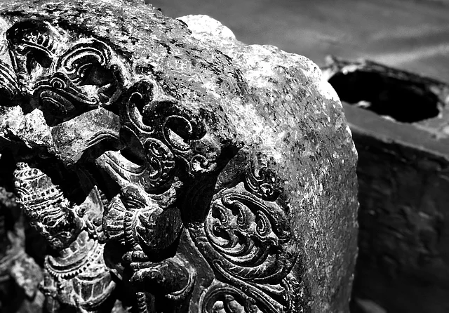 Broken wooden dais behind the sculpture of the Dancing Durga.
