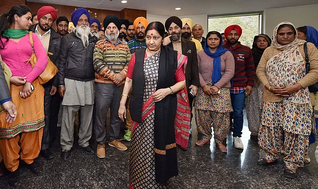Then-external affairs minister Swaraj meeting family members of Indians, hailing from Punjab, stranded in Iraq. This was at the Jawahar Lal Bhavan in New Delhi on 7 February 2016.