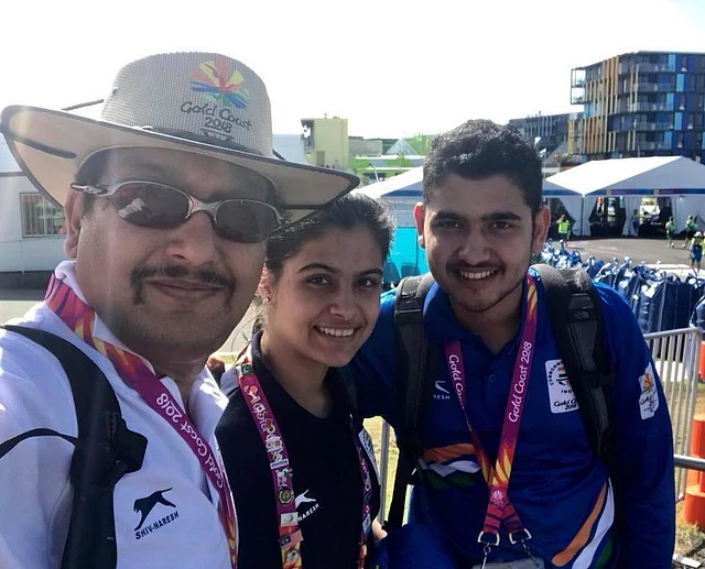Junior national shooting coach Jaspal Rana with Indian shooters Manu Bhaker and Anish Bhanwala.