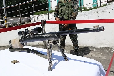 Srinagar: The US made sniper rifle M24 that was recovered by security forces during raids at terror hideouts along the Amarnath Yatra route, in Srinagar on Aug 2, 2019. Security forces had recovered an anti-personnel mine of Pakistan Ordnance along the route leading to Amarnath cave. Citing intelligence inputs of terror threats, the Jammu and Kashmir government on Friday issued an advisory asking Amarnath pilgrims and tourists to “curtail” their stay in the valley and leave “as soon as possible”.