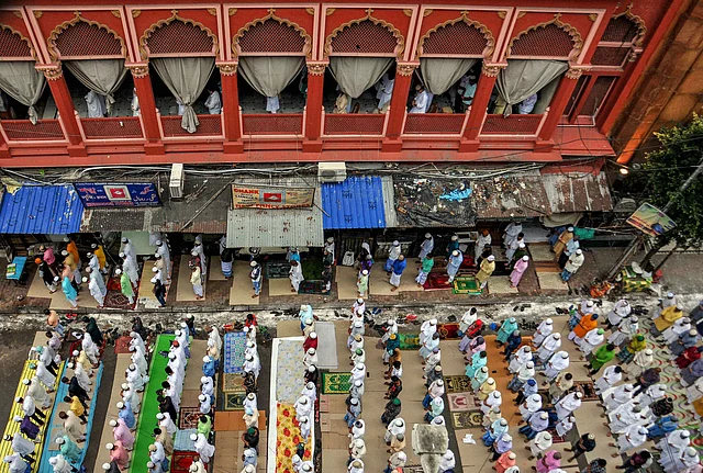 Muslims offer Eid al-Adha prayers at Nakhoda Masjid, in Kolkata.