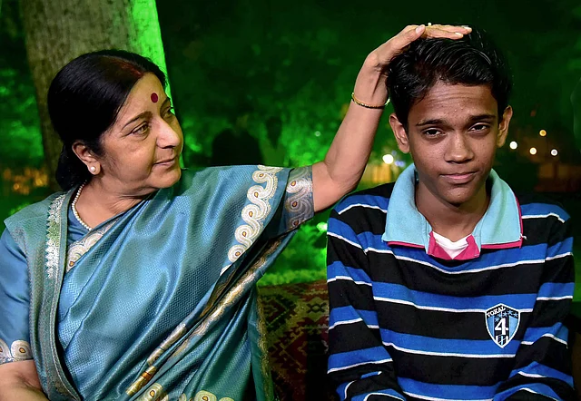 Then-external affairs minister Sushma Swaraj with Pakistani boy Mohammad Ramzan who was recovered from Bhopal railway station in Bhopal on 22 November 2015.
