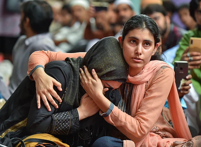 A Muslim woman gets emotional as she celebrates Eid with Kashmiri students who could not reach their families in the wake of abrogation of Article 370 in the state of Jammu and Kashmir.