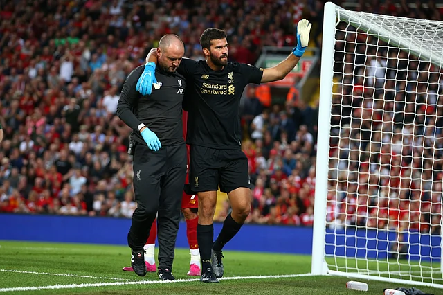 Liverpool goalkeeper Alisson was forced off in the first half at Anfield with a calf injury.