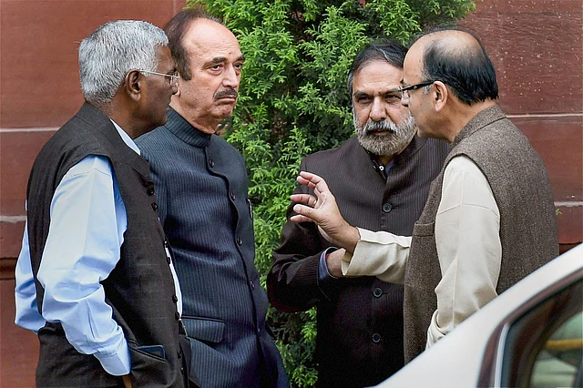 This 16 February 2016 file photo shows Union Minister for Finance Arun Jaitley, Congress leaders Ghulam Nabi Azad, Anand Sharma and CPI leader D Raja after an all-party meeting called by Prime Minister Narendra Modi at South Block in New Delhi.