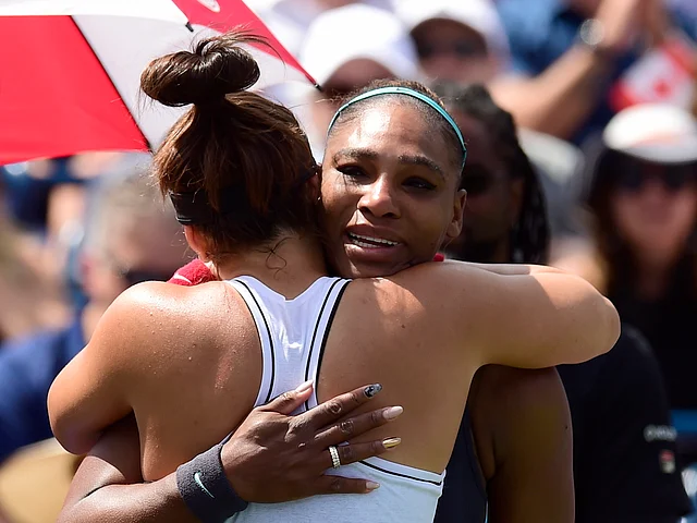 Canada’s Bianca Andreescu, left, consoles Serena Williams, of the United States, after Williams had to retire from the final of the Rogers Cup tennis tournament in Toronto, Sunday, Aug. 11, 2019. 