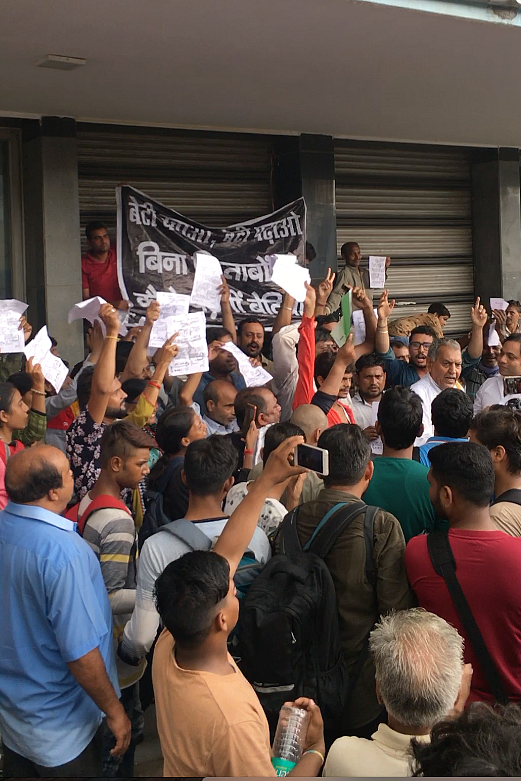 Vendors protest at the older market area.