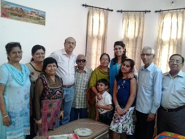 Mr. Ram Singh in the middle in black glasses, with his wife and three former P.P.S. colleagues and their families. An early 2013 picture.