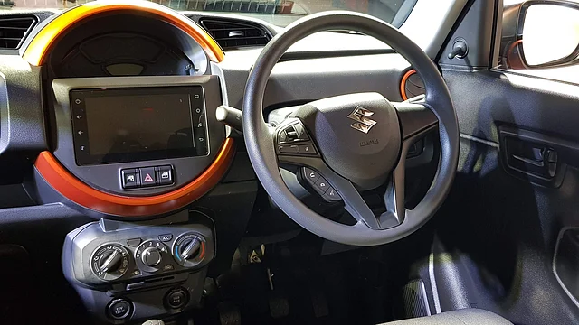 The Maruti S-Presso has power-window switches on the dash and steering-mounted audio controls. 