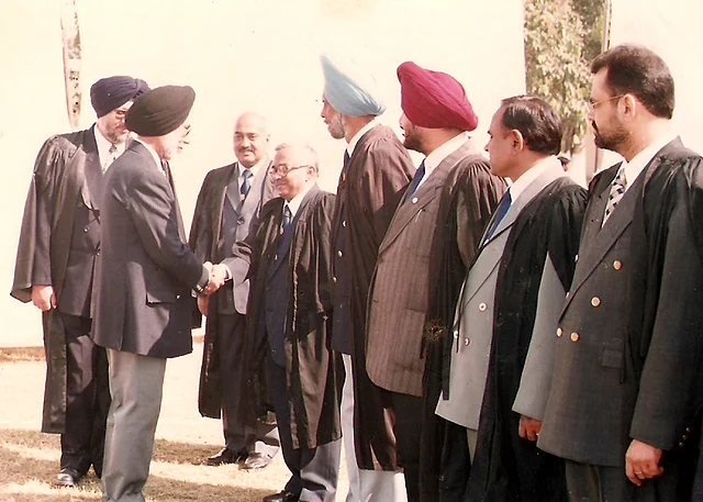 The school Headmaster, Mr. Manjitinder Singh Bedi, an old Nabhaite himself, is introducing the Founders’ Day chief guest to Mr. Ram Singh.