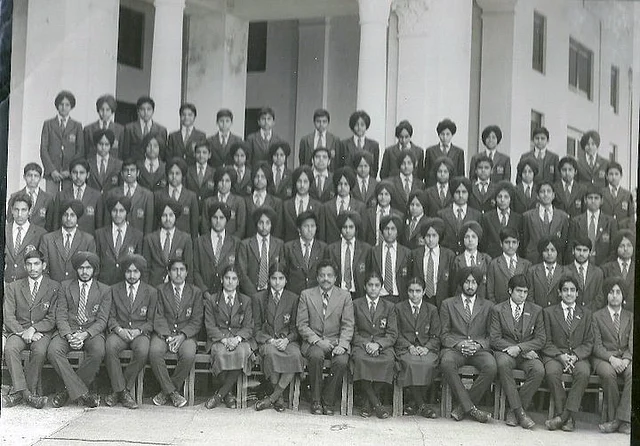 Beas House picture (Mr Menon, with senior Beas House as its housemaster; sitting in the center, in this 1986 picture).