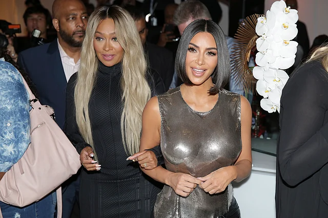 La La Anthony, left, and Kim Kardashian arrive to the Serena Williams fashion show during Fashion Week in New York, Tuesday, Sept. 10, 2019.