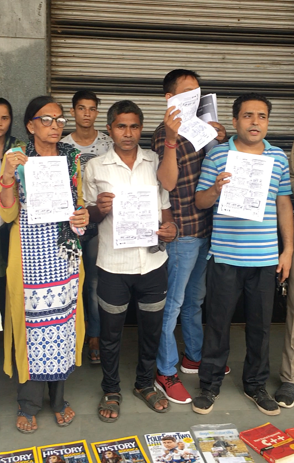 Protestors demand for The Street Vendors Act to be followed.