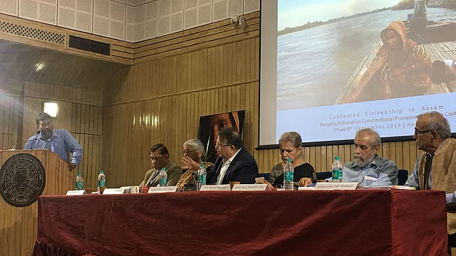 Justice (Retd) AP Shah (third from left) asking questions to an activist who deposed before the People’s Tribunal in Delhi.