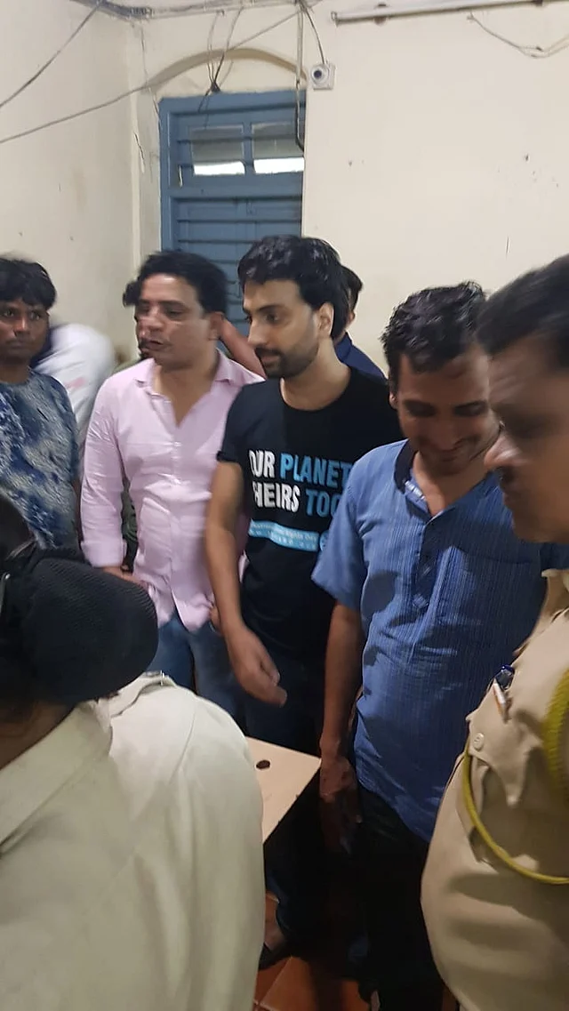 Protesters detained by Mumbai Police.