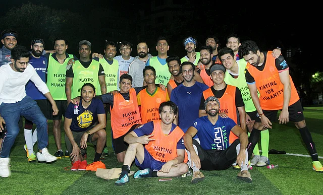 MS Dhoni and Leander Paes during a football match in Mumbai.