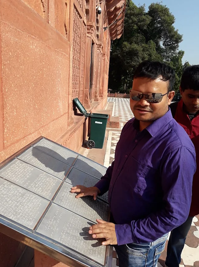 A Braille inscription made from a steel plate outside Taj Mahal Museum.