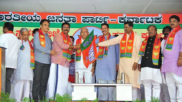 Disqualified MLA Anand Singh joining the BJP. 