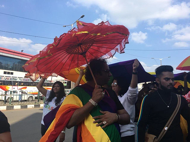 Multiple protesters sported rainbow coloured outfits to extend support for the community. 