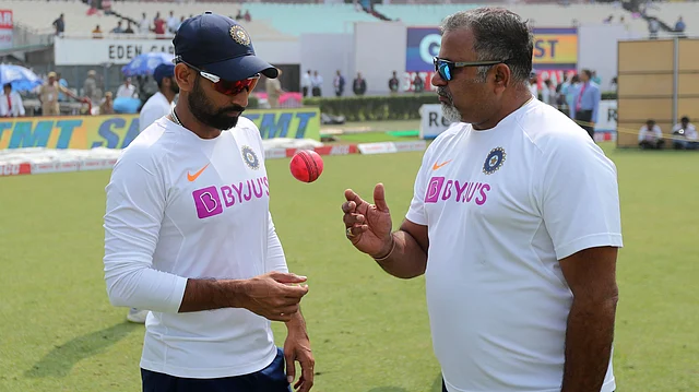 Mohammed Shami seen here talking with the Indian bowling team coach Bharat Arun at the Eden Gardens.