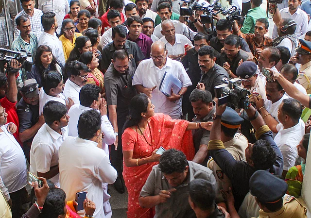 NCP chief Sharad Pawar with his daughter and party MP Supriya Sule leaves for a meeting of Congress-NCP leaders, in Mumbai on Wednesday, Nov. 27, 2019.