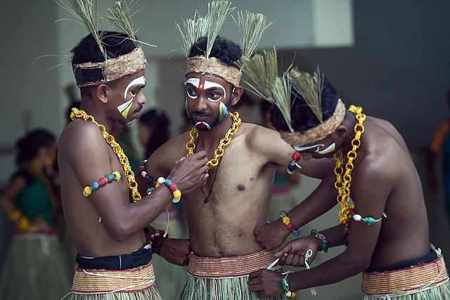 Tribal artists prepare to participate at the Palangudi Natham, a tribal cultural festival, in Chennai on Tuesday.