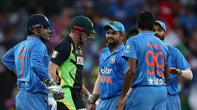 R Ashwin celebrates a wicket with his India team-mates during a T20 against Australia on 31 Jan, 2016.