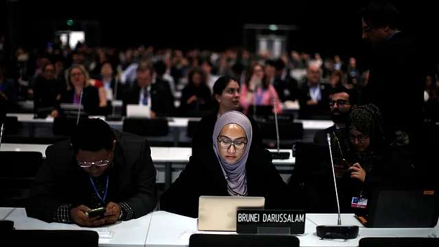 Participants take part at the COP25 climate talks congress in Madrid, Spain. 
