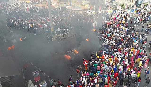 Tinsukia: College students along with locals burn tyres during their protest strike against the Citizenship Amendment Bill.