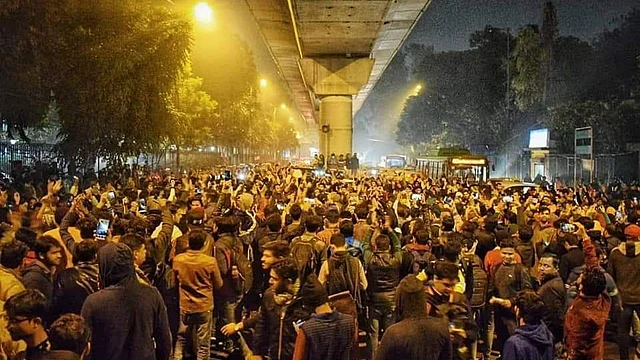 Hundreds of Jamia students shout slogans while they protest against the Act.