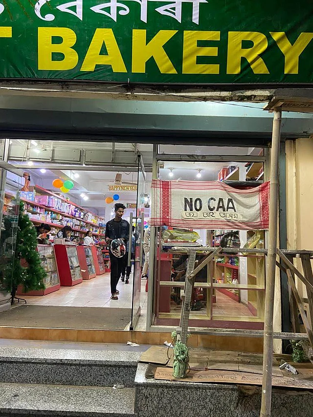 A bakery in Assam’s Tezpur with a Gamosa as an anti-CAA banner.