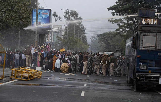 Police use water cannon to disperse protestors gathered against the Citizenship Amendment Bill (CAB) in Guwahati.