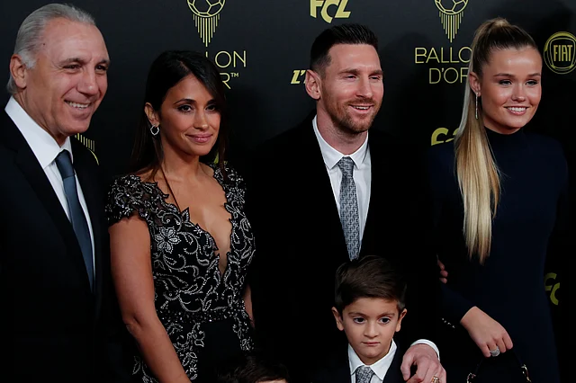 Barcelona’s Lionel Messi poses with his family during the Golden Ball award ceremony at the Grand Palais in Paris, Monday, Dec. 2, 2019. 