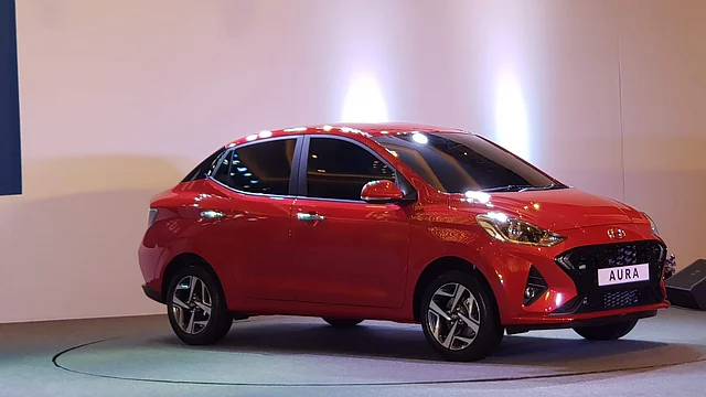 The Hyundai Aura gets a floating-roof effect.