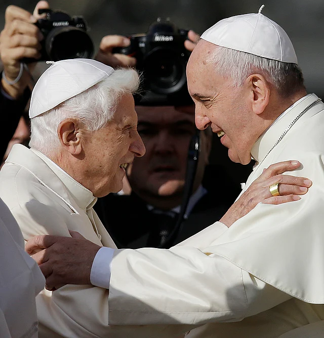 Pope Francis (right) and former Pope Benedict VI greeting each other in St Peter’s Square at the Vatican on 28 September 2019.
