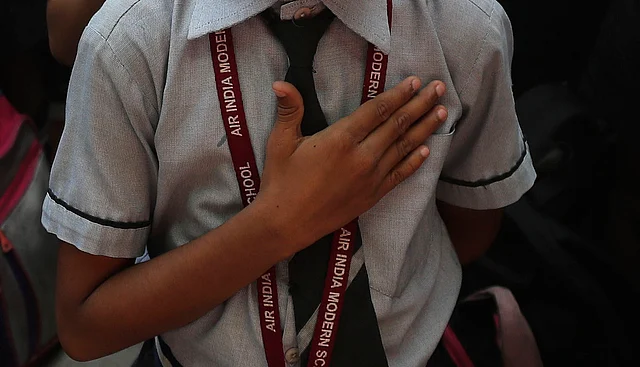 School children recite the Preamble to the Indian Constitution during the daily assembly in Mumbai on Monday, 27 January. 