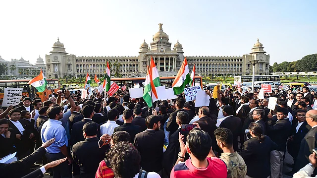 Lawyers hold placards and raise slogans during a protest against CAA, NRC and NPR in front Karnataka High Court, in Bengaluru, Thursday, 9 Jan 2020.