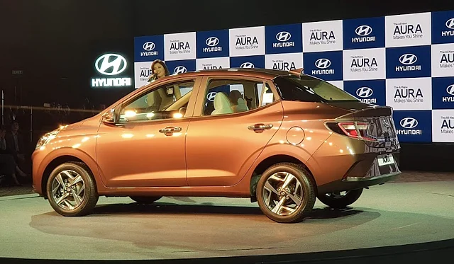 The Hyundai Aura has a coupe-like design. 