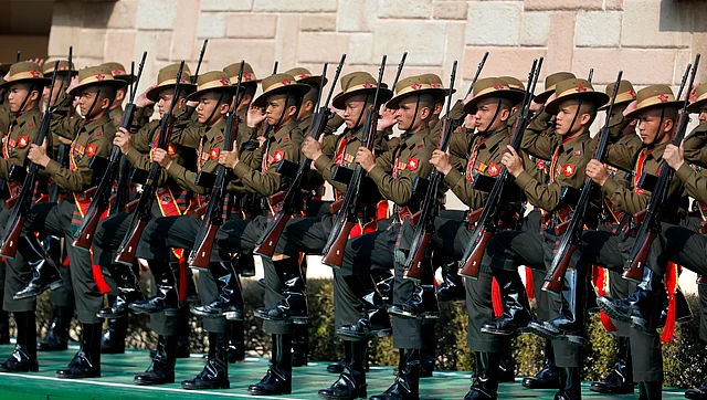 Soldiers pay tribute to Mahatma Gandhi at Rajghat, a memorial to Mahatma Gandhi, on his death anniversary in New Delhi on Thursday, 30 January.
