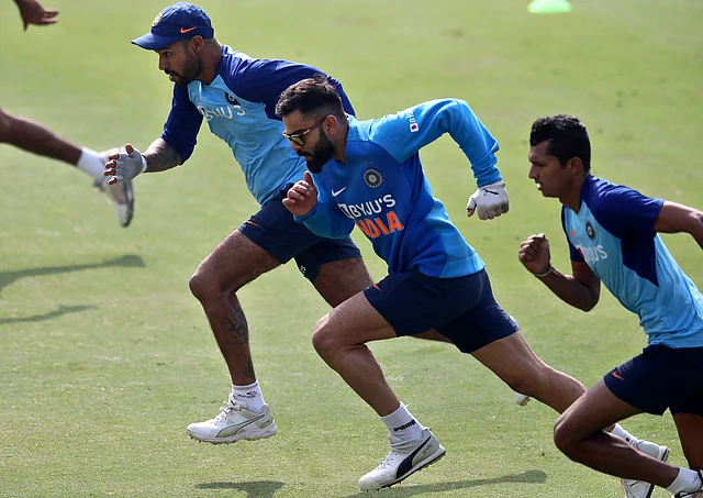 India’s captain Virat Kohli, middle, and his team mates run during a training session ahead of their first Twenty20 cricket match against Sri Lankain Gauhati, India, Saturday, Jan. 4, 2020. 