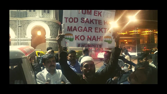 Mohammad Ikram, a 46-year-old fashion designer, at the Gateway of India protest.