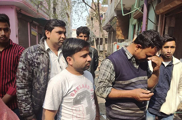 Akbar, a meat shop owner in Ashok Nagar, breaks down while recounting the horror.