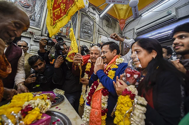 The AAP members offered prayers at the Hanuman Mandir in Connaught Place after the party’s thumping win in the Assembly elections in New Delhi, on Tuesday, 11 February 2020.