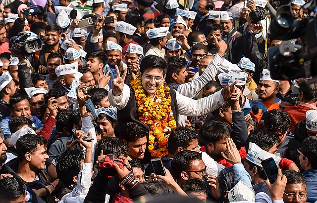 Aam Aadmi Party (AAP) leader Raghav Chadha displays victory sign after his win in the Delhi Assembly polls at a counting centre in New Delhi, Tuesday, 11 February 2020. 