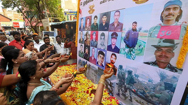 Members of the general public pay tribute to the martyred CRPF jawans who lost their lives in a suicide-bomber attack in Pulwama last year, in Chennai, on Friday.