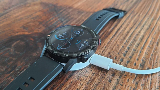 The watch comes with a magnetic charger. 
