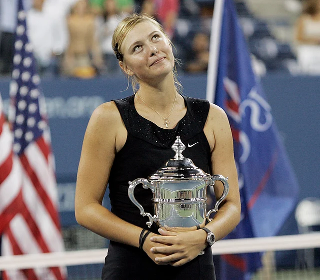 In this Sept. 9, 2006, file photo, Maria Sharapova looks up to the crowd after winning the women’s singles championship over Justin Henin-Hardenne of Belgium at the U.S. Open tennis tournament in New York.