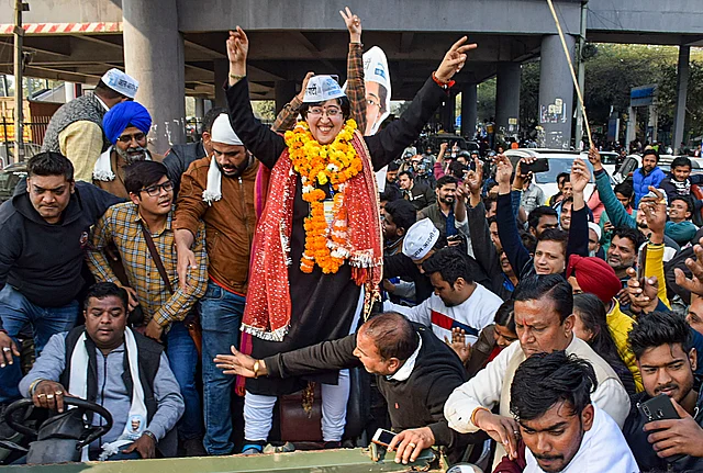 Aam Aadmi Party (AAP) leader Atishi Marlena displays victory sign after partys victory in the Delhi Assembly elections, in New Delhi, Tuesday, 11 February 2020. 