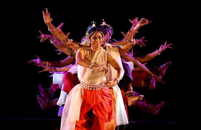 Noted Odissi dancer Sharmila Biswas performs with her toupe on the second day of the 16th Dhauli-Kalinga Mahotsav in Bhubaneswar, on Tuesday.
