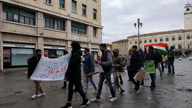 Protesters in Pisa stage a march to the Leaning Tower of Pisa.